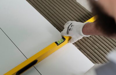 tiler-working-renovation-apartment_23-2149278626